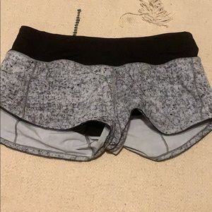 Grey speckled lululemon shorts.